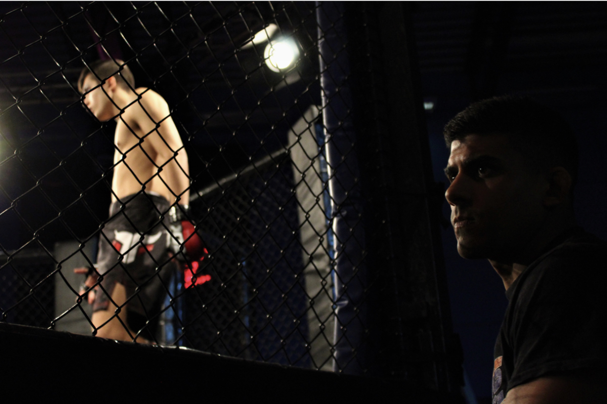 Nick cageside watching his fighter